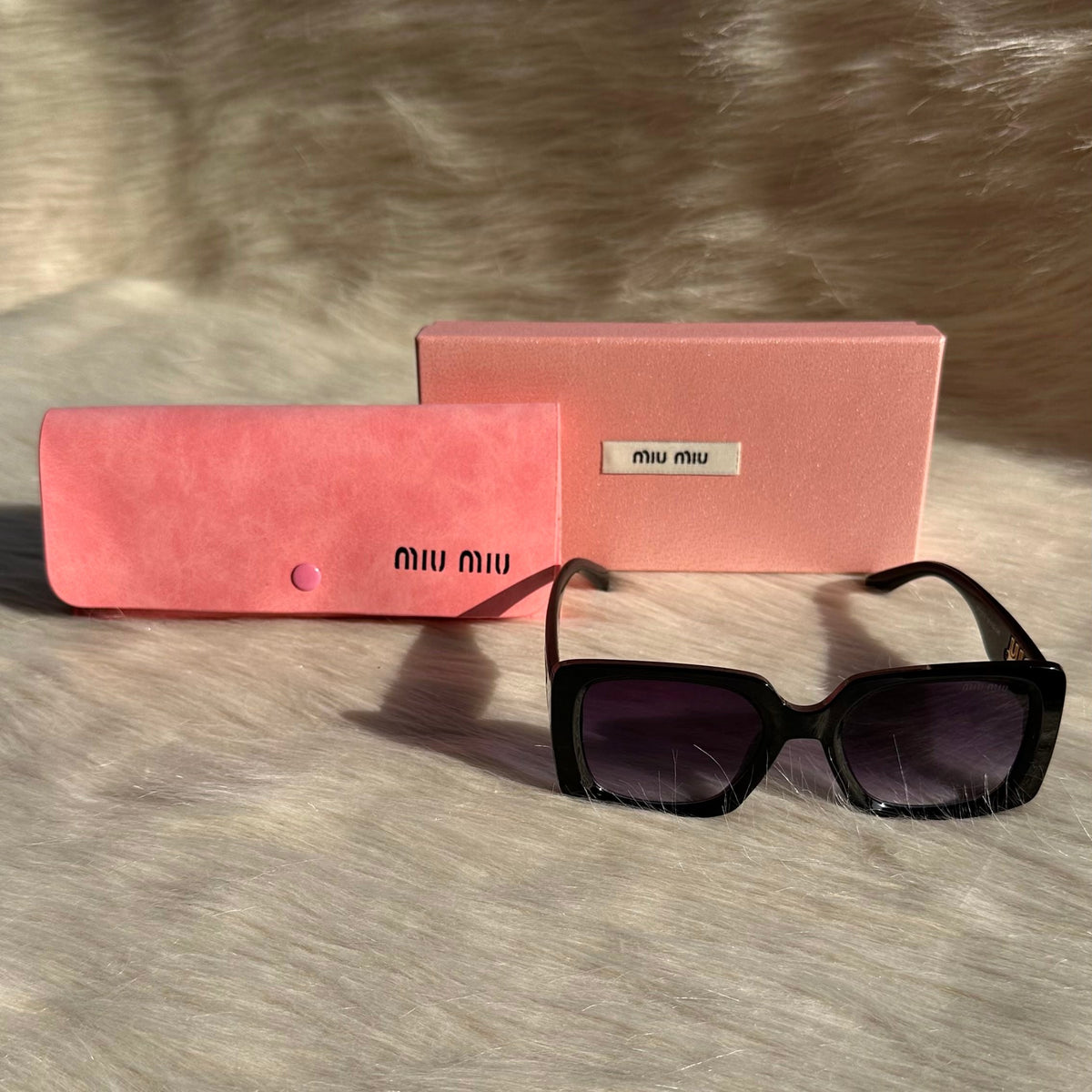MIU MIU Black Oversized Sunglasses – Bold Elegance