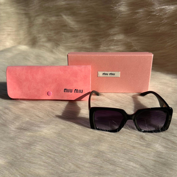 MIU MIU Black Oversized Sunglasses – Bold Elegance