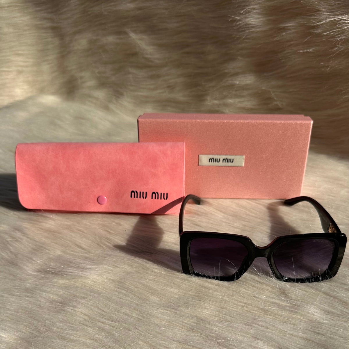 MIU MIU Black Oversized Sunglasses – Bold Elegance