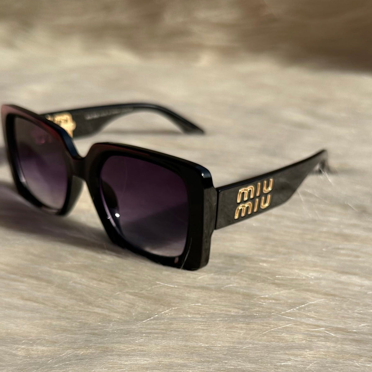 MIU MIU Black Oversized Sunglasses – Bold Elegance