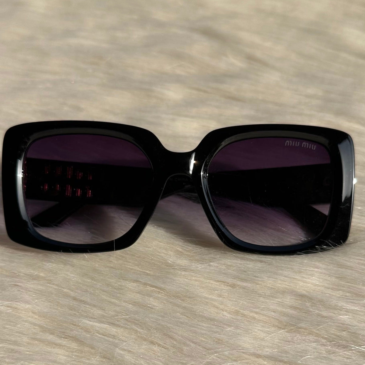 MIU MIU Black Oversized Sunglasses – Bold Elegance