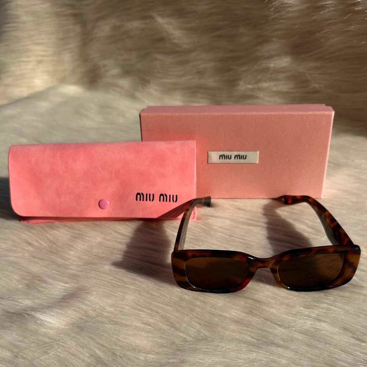 Miu Miu Oversized Tortoiseshell Sunglasses – Iconic Elegance