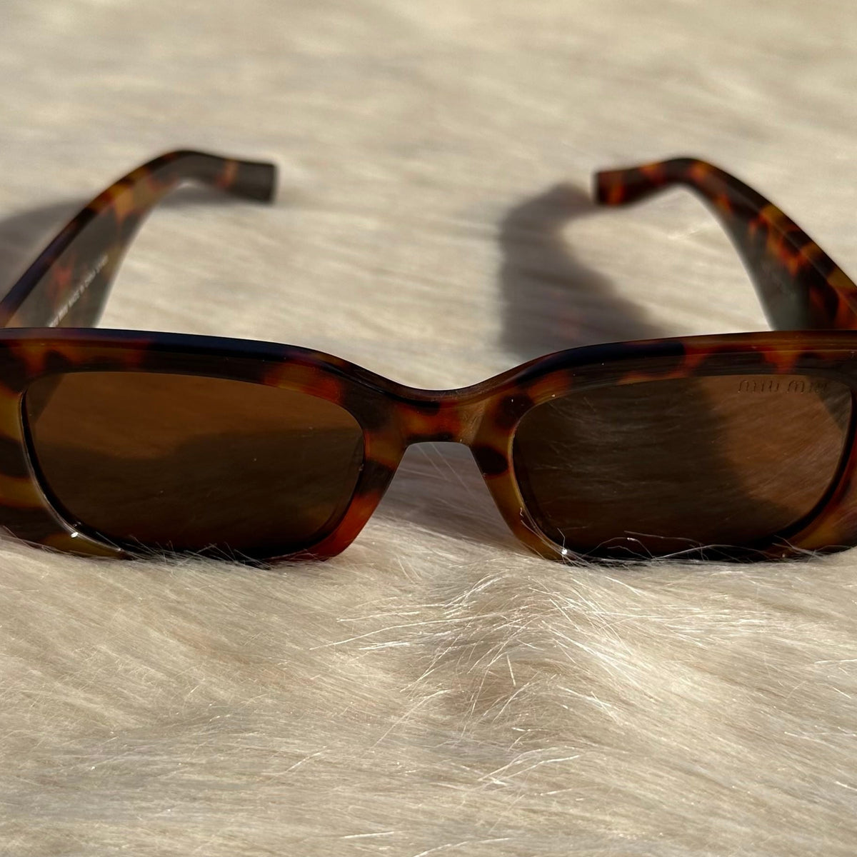 Miu Miu Oversized Tortoiseshell Sunglasses – Iconic Elegance