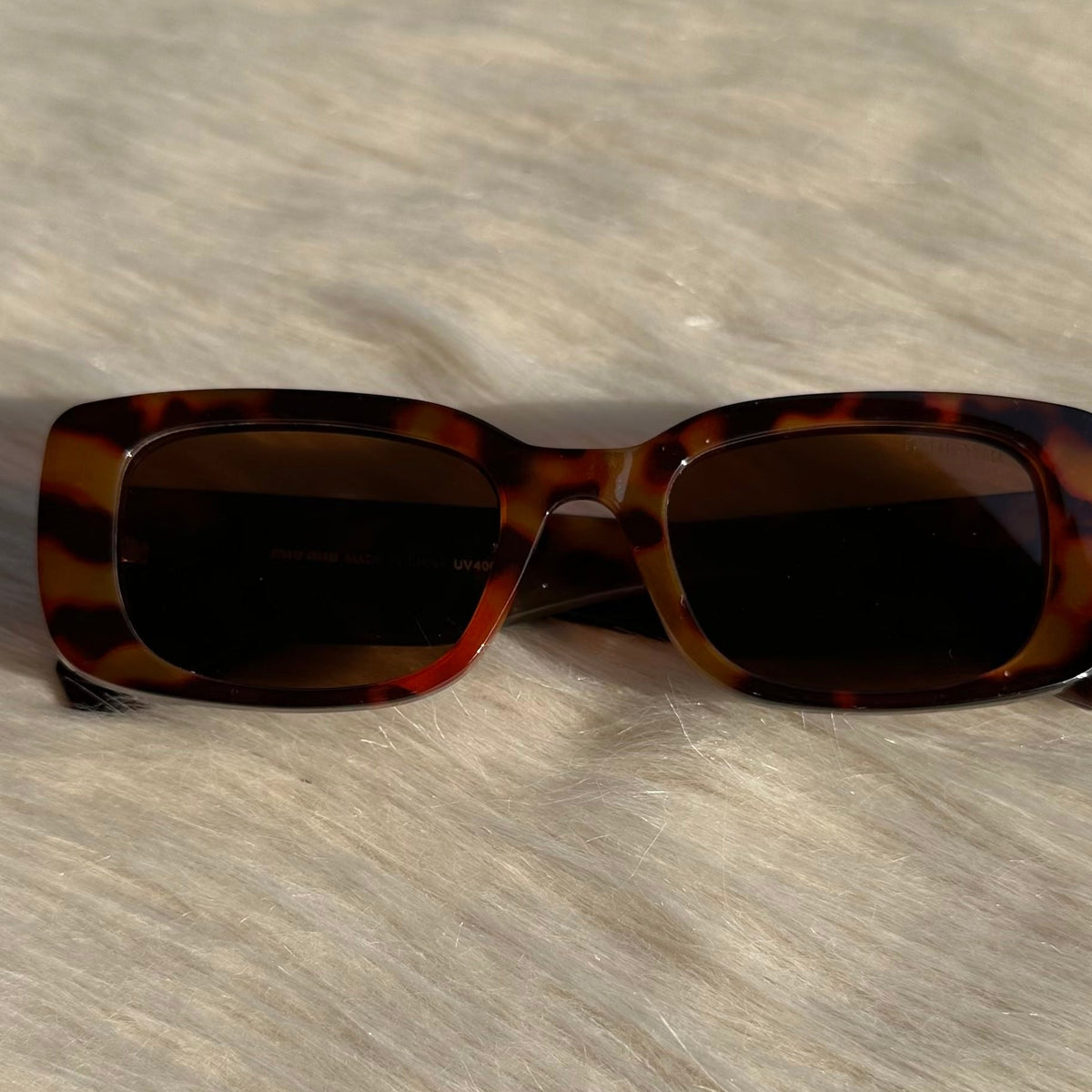 Miu Miu Oversized Tortoiseshell Sunglasses – Iconic Elegance