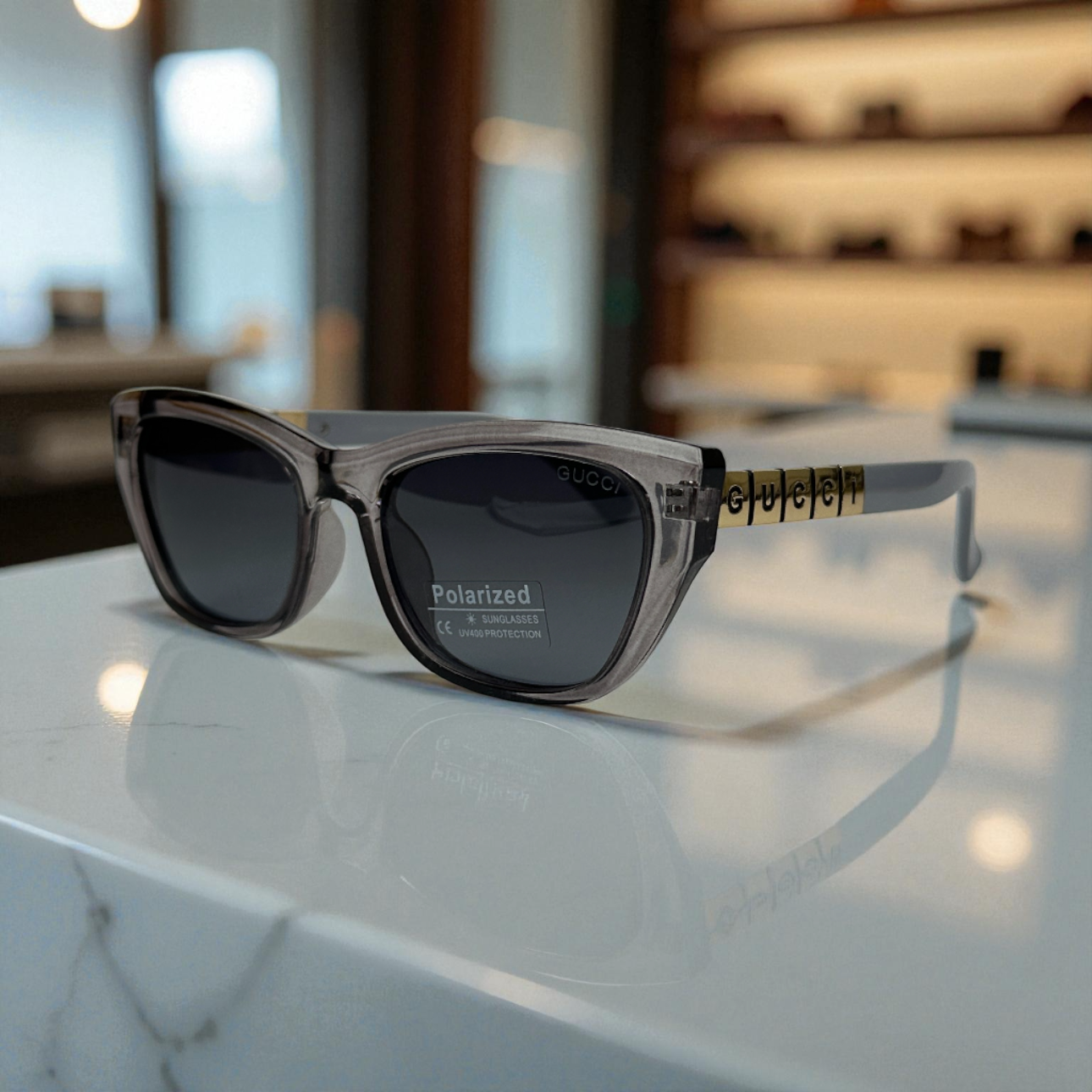 Bold Full-Grey Cat Eye Sunglasses with Gold Logo Temple Detail