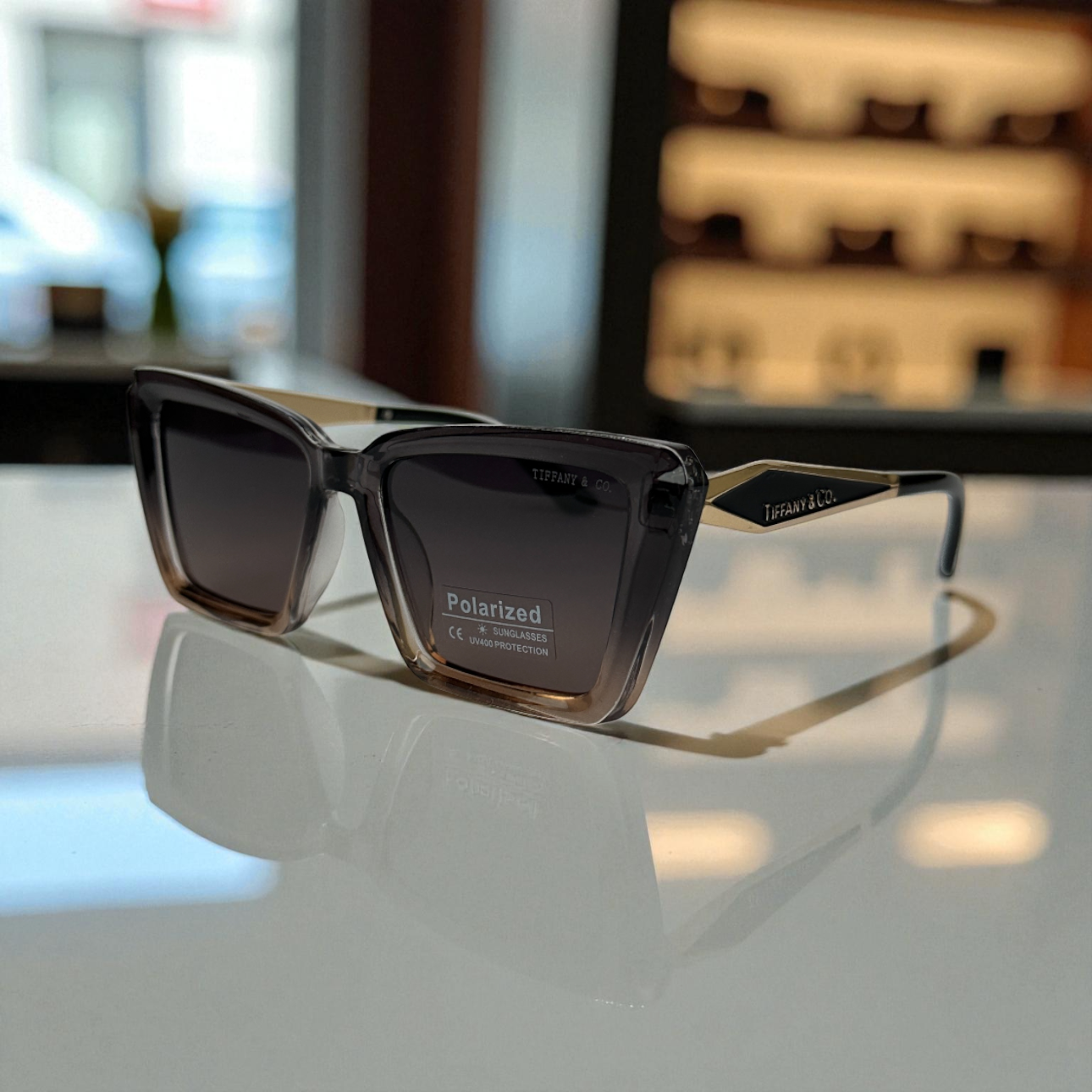 Ti.ffany & Co. Polarized Cat-Eye Sunglasses – Black Gradient with Gold Detailing