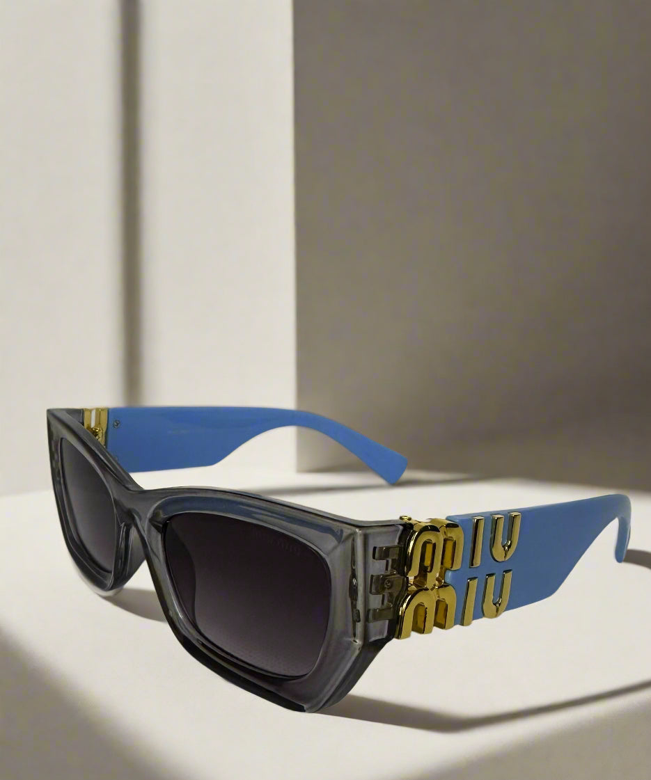 Miu Miu Blue Statement Sunglasses with Gold Accents