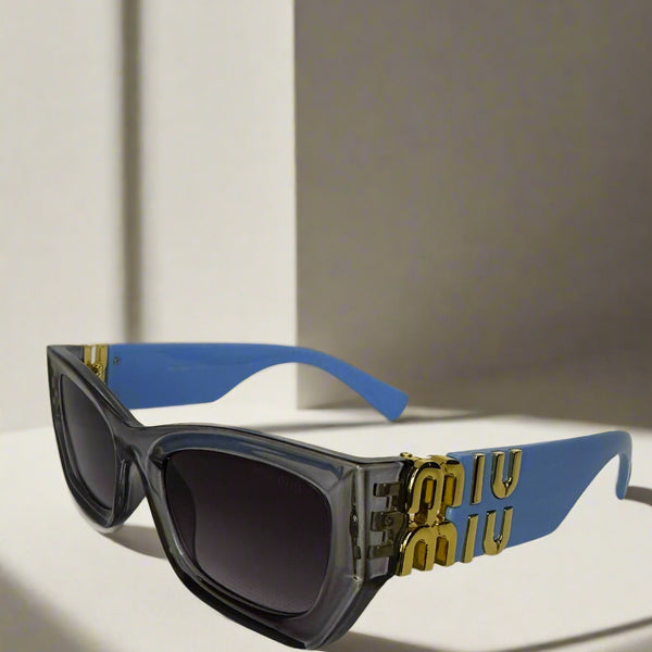 Miu Miu Blue Statement Sunglasses with Gold Accents