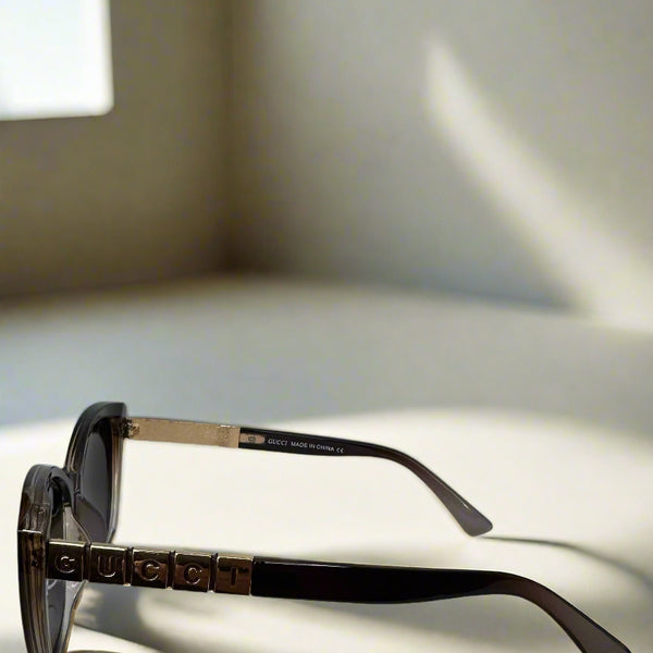 Gucci Cat-Eye Polarized Sunglasses with Gold Logo Arms