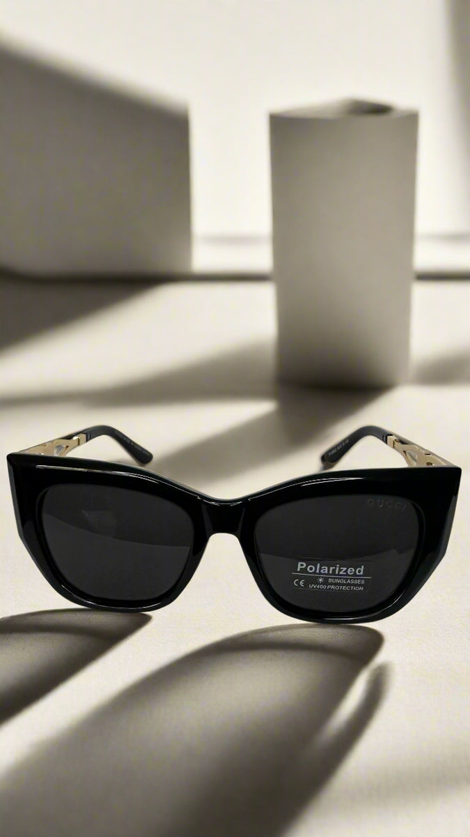 Gucci Black Polarized Cat-Eye Sunglasses with Gold Interlocking GG Arms