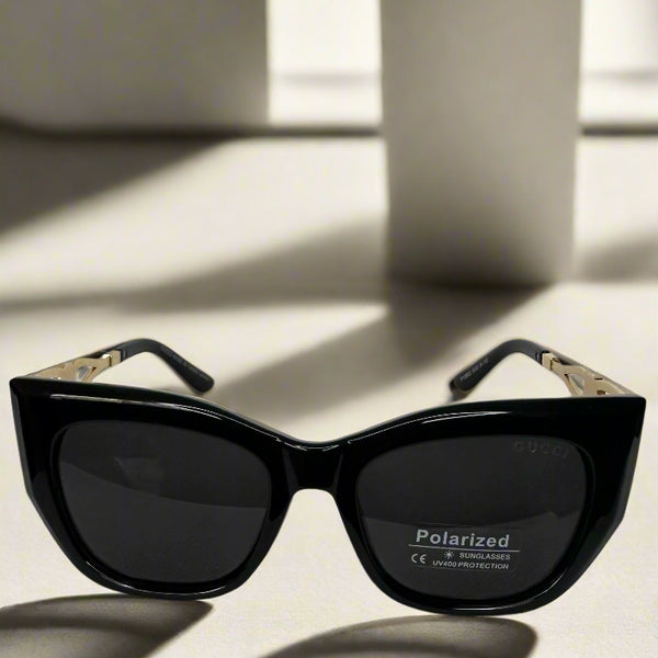 Gucci Black Polarized Cat-Eye Sunglasses with Gold Interlocking GG Arms