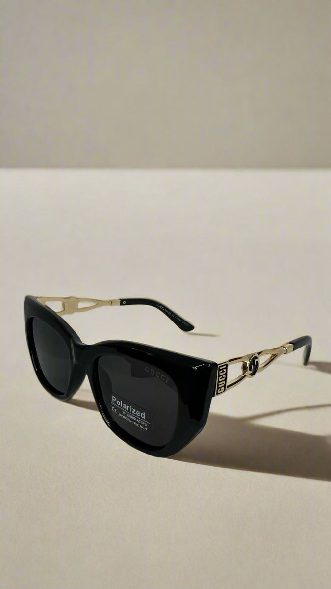 Gucci Black Polarized Cat-Eye Sunglasses with Gold Interlocking GG Arms