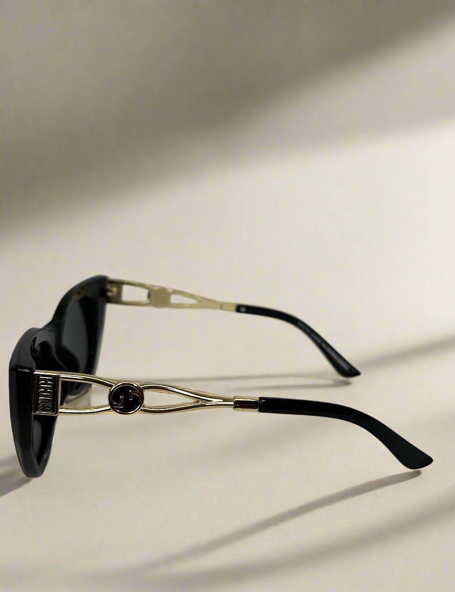 Gucci Black Polarized Cat-Eye Sunglasses with Gold Interlocking GG Arms