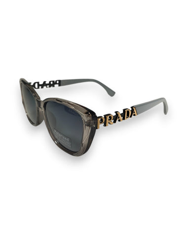 Prada Translucent Grey Cat-Eye Sunglasses with Gold Emblem