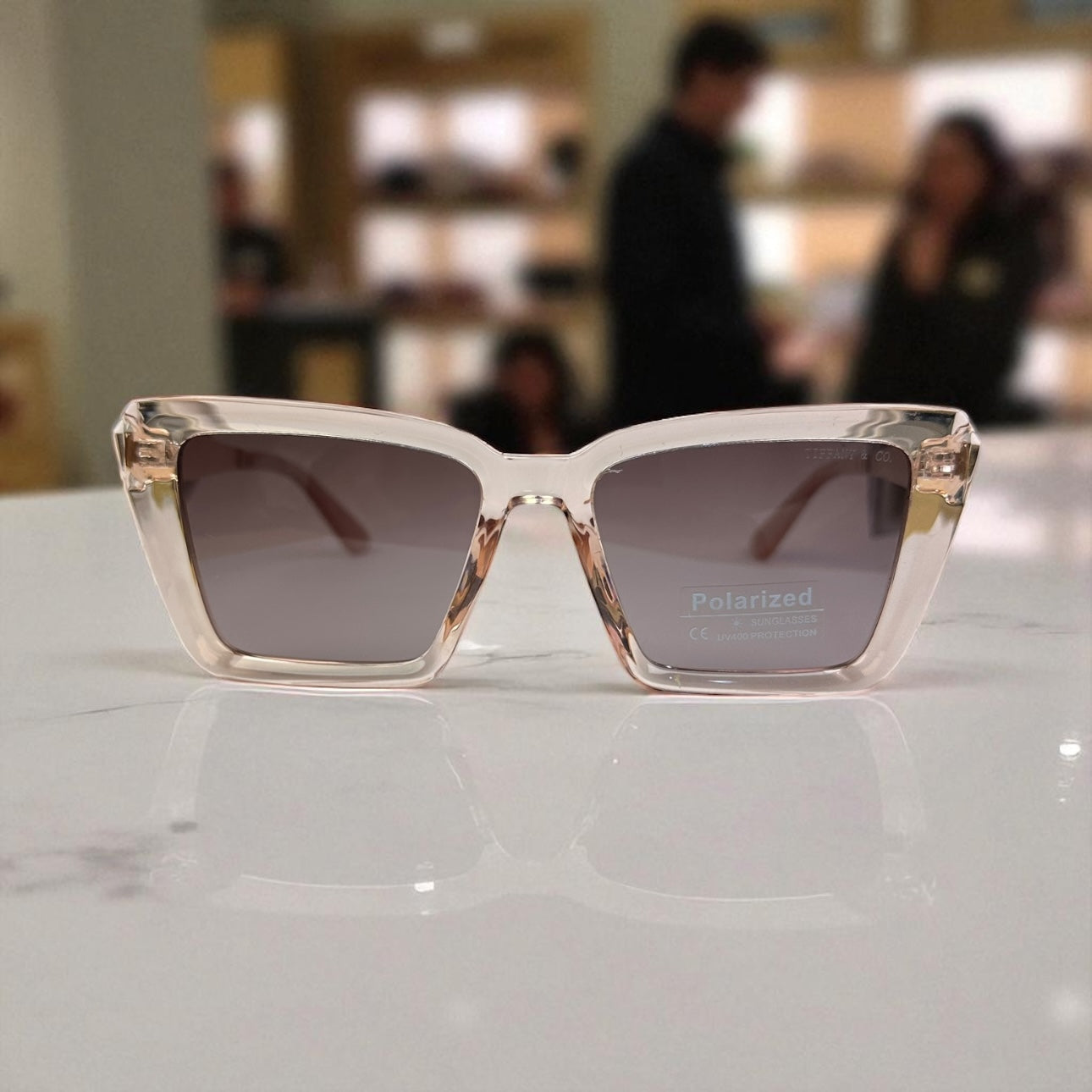 Elegant Blush Pink Cat-Eye Polarized Sunglasses with Gold Temple Detail