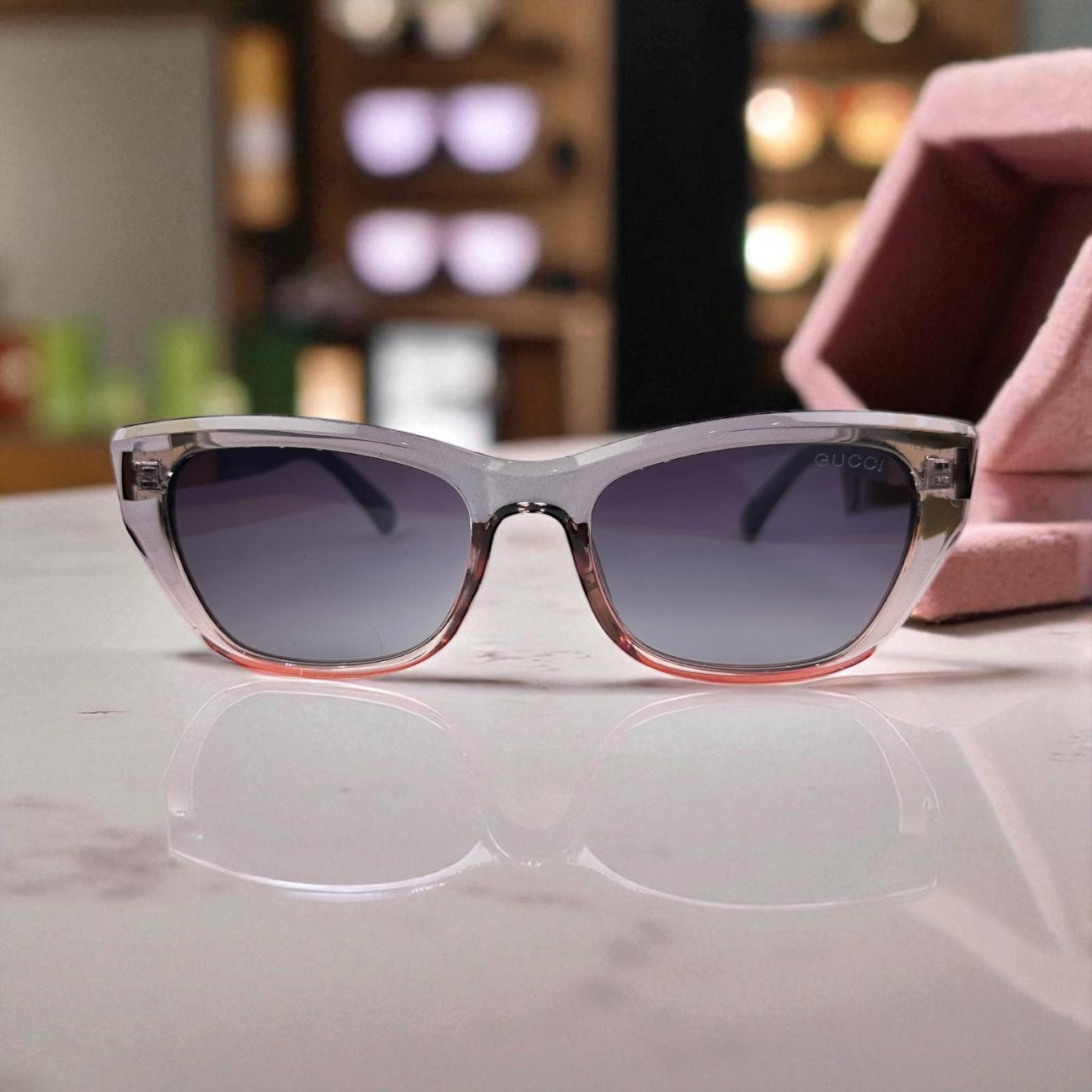 Playful Pink & Grey Cat-Eye Gucci Sunglasses with Bold Gold Logo Temple