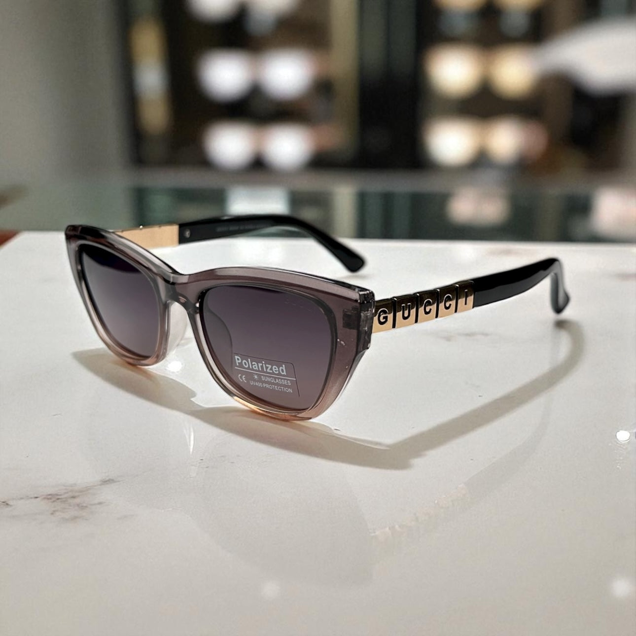 Gu.cci Translucent Cat-Eye Sunglasses with Signature Block Logo