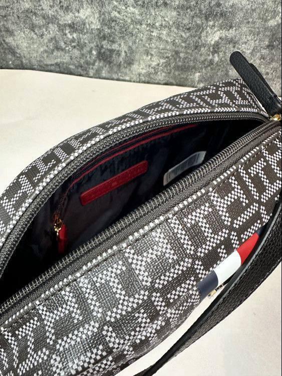 Tommy Hilfiger Signature Monogram Crossbody Bag – Bold & Iconic Style