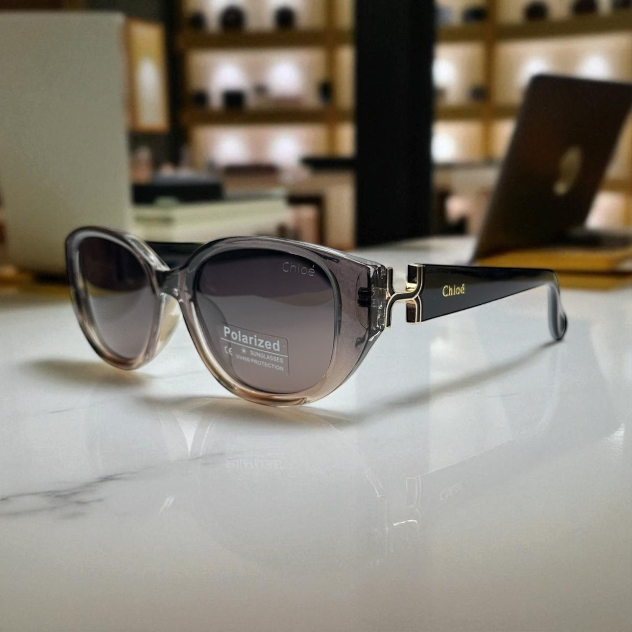 Chloé Oval Polarized Sunglasses – Black Gradient Frame with Gold Accent UV400 Protection