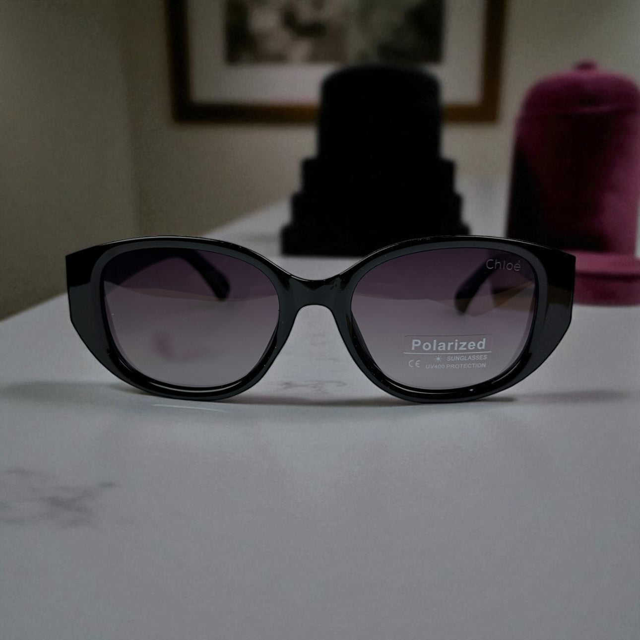 Chloé Oval Polarized Sunglasses – Glossy Black Frame with Gold Detail UV400 Luxury