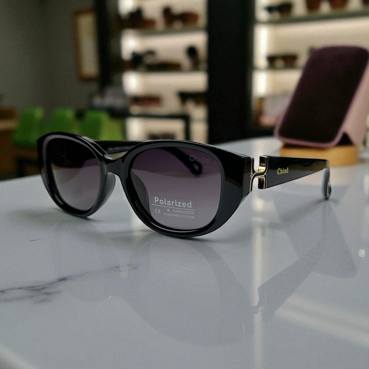 Chloé Oval Polarized Sunglasses – Glossy Black Frame with Gold Detail UV400 Luxury