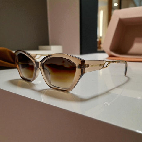 Miu Miu Cat-Eye Polarized Sunglasses – Nude Gradient Frame with Gold Detail UV400