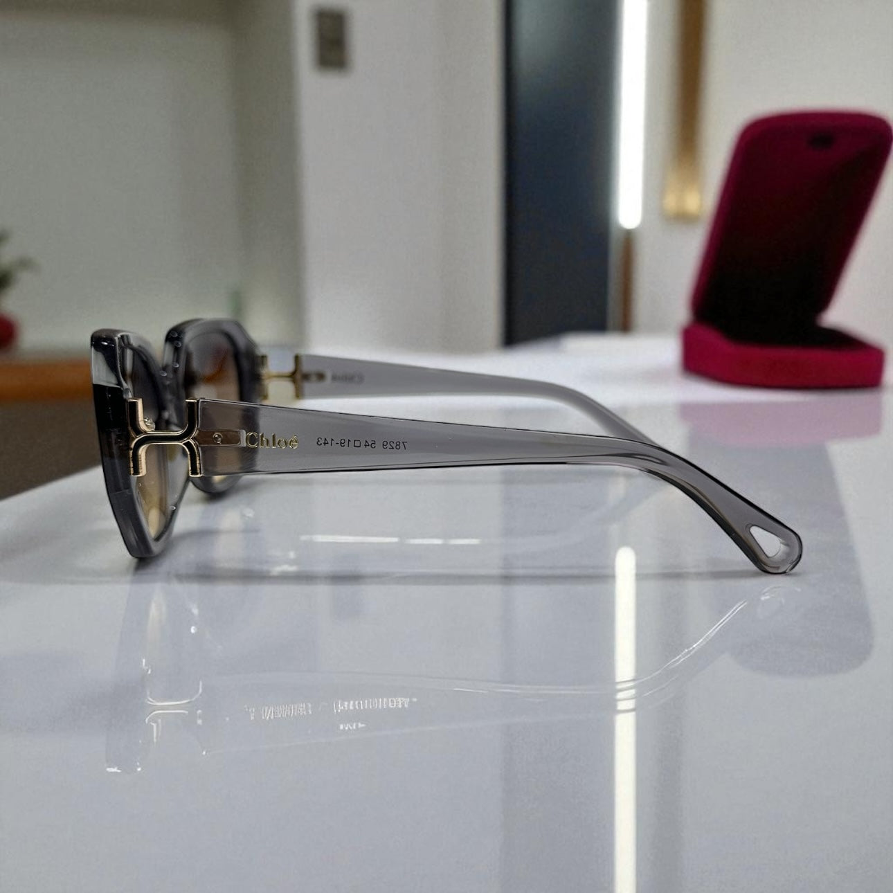 Chloé Gradient Oversized Sunglasses – Grey Crystal Frame with Gold Accents UV400