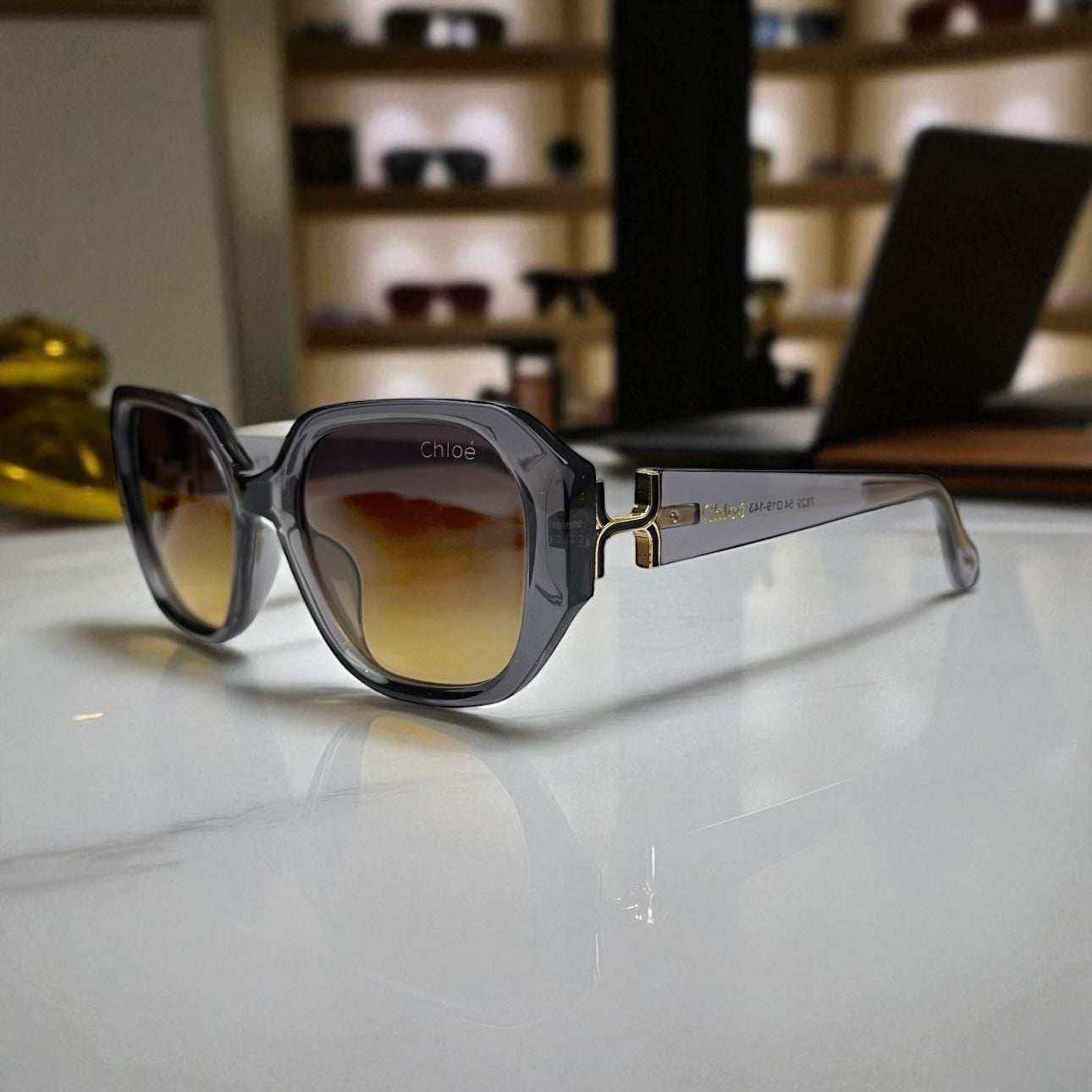 Chloé Gradient Oversized Sunglasses – Grey Crystal Frame with Gold Accents UV400