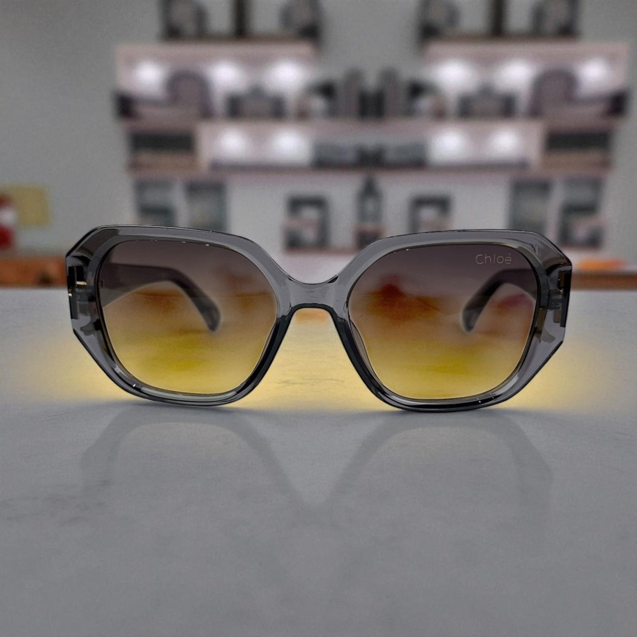 Chloé Gradient Oversized Sunglasses – Grey Crystal Frame with Gold Accents UV400