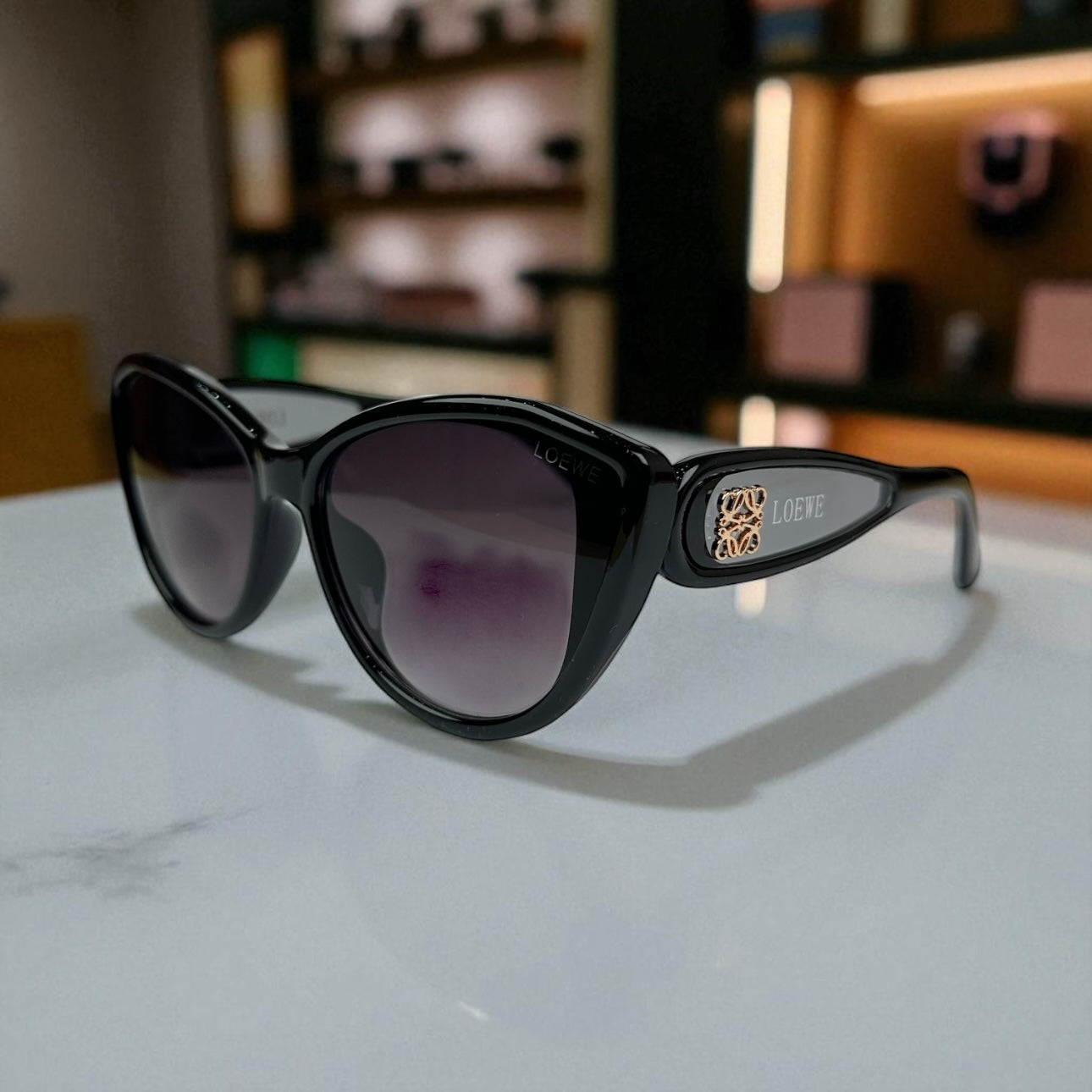 Loewe Cat-Eye Polarized Sunglasses – Black Gloss Frame with Gold Logo Detail UV400