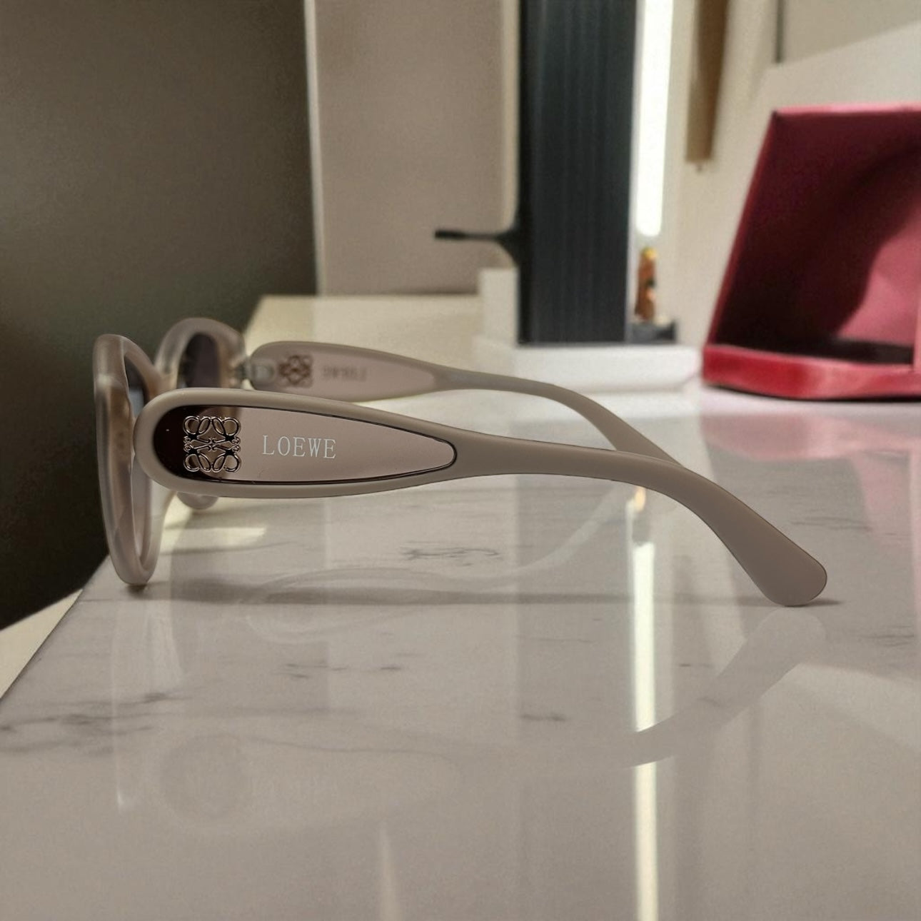 Loewe Cat-Eye Sunglasses – Ivory Matte Frame with Gold Anagram Detailing UV400