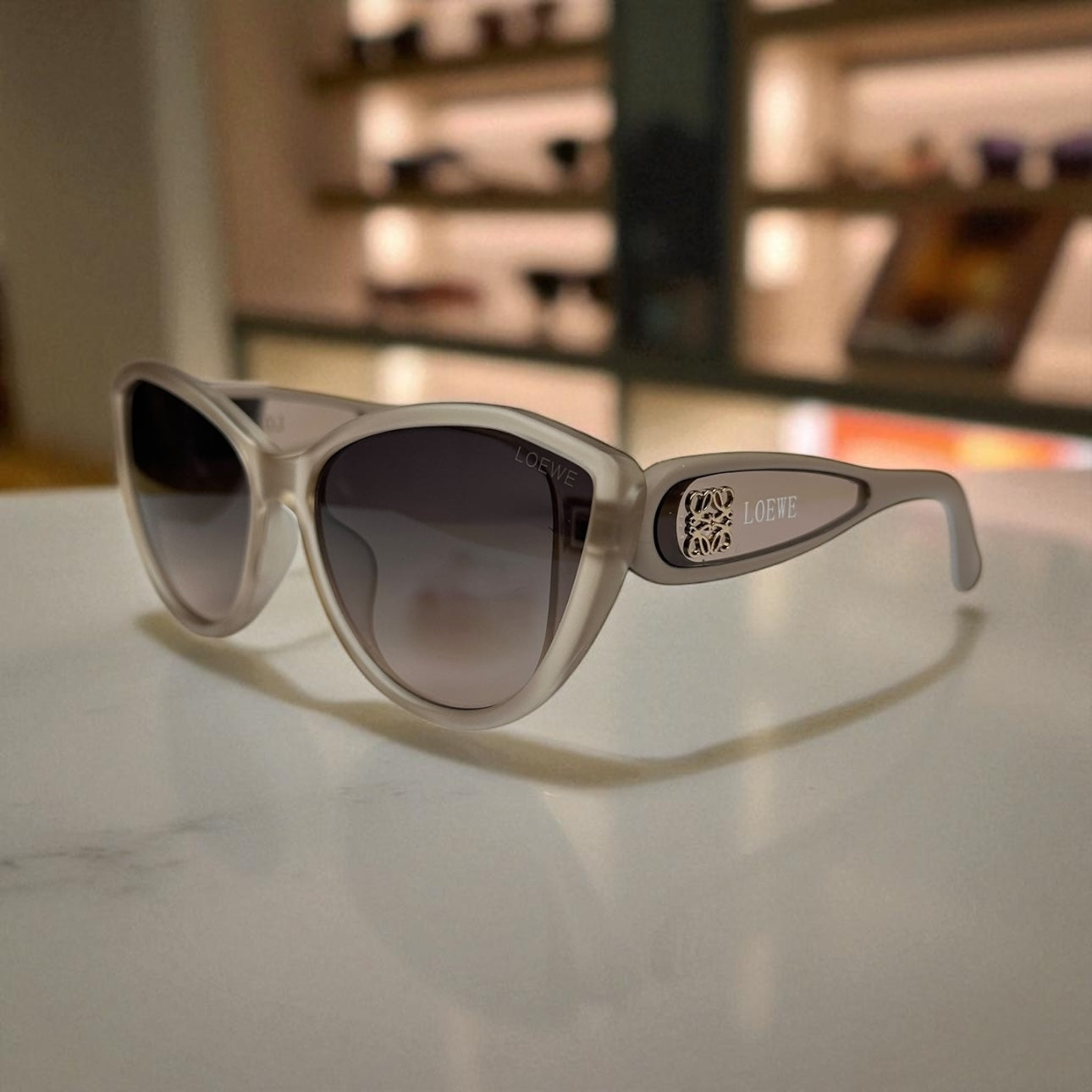Loewe Cat-Eye Sunglasses – Ivory Matte Frame with Gold Anagram Detailing UV400