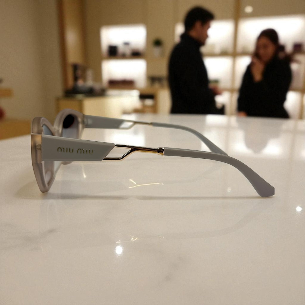 Miu Miu Butterfly Sunglasses – Ivory Gray Frame with Gold Metal Detailing UV400