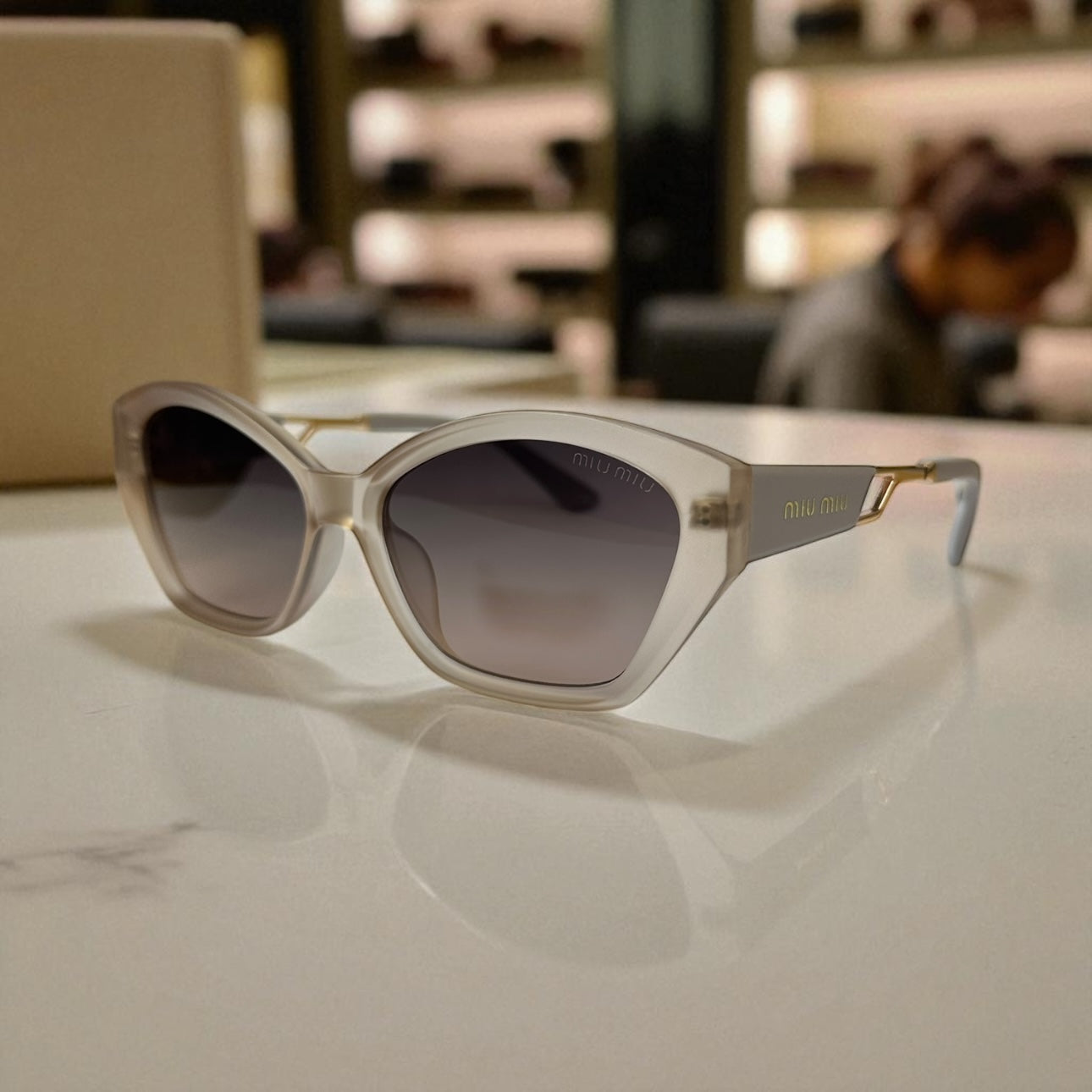 Miu Miu Butterfly Sunglasses – Ivory Gray Frame with Gold Metal Detailing UV400