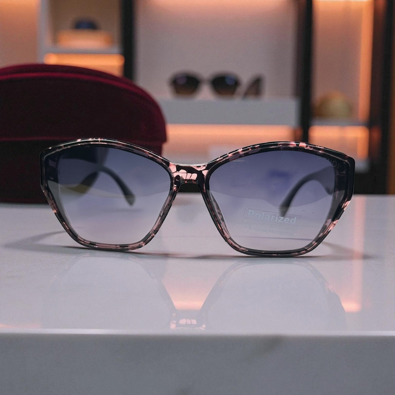 Fendi Polarized Sunglasses – Pink Marble Frame with Iconic Geometric Gold Temples UV400