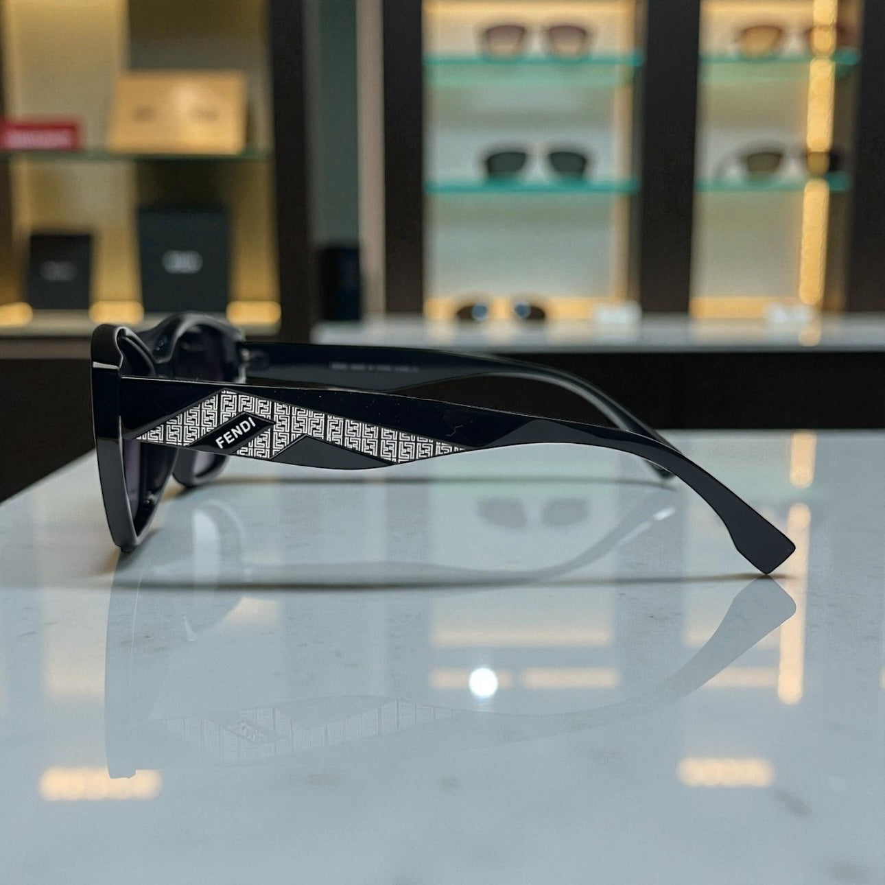 Fendi Polarized Sunglasses – Black Cat-Eye Frame with Silver Monogram Temples UV400