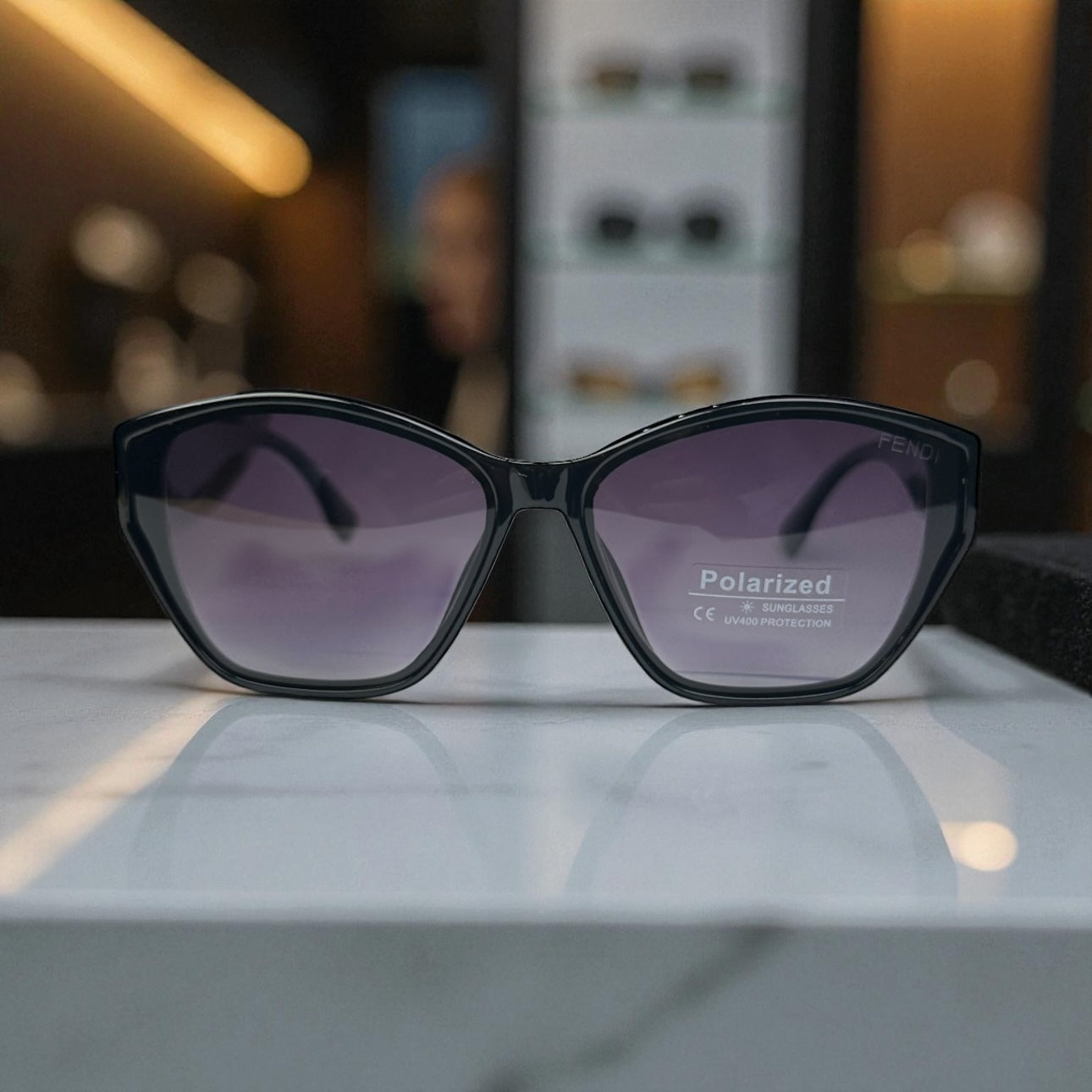 Fendi Polarized Sunglasses – Black Cat-Eye Frame with Silver Monogram Temples UV400