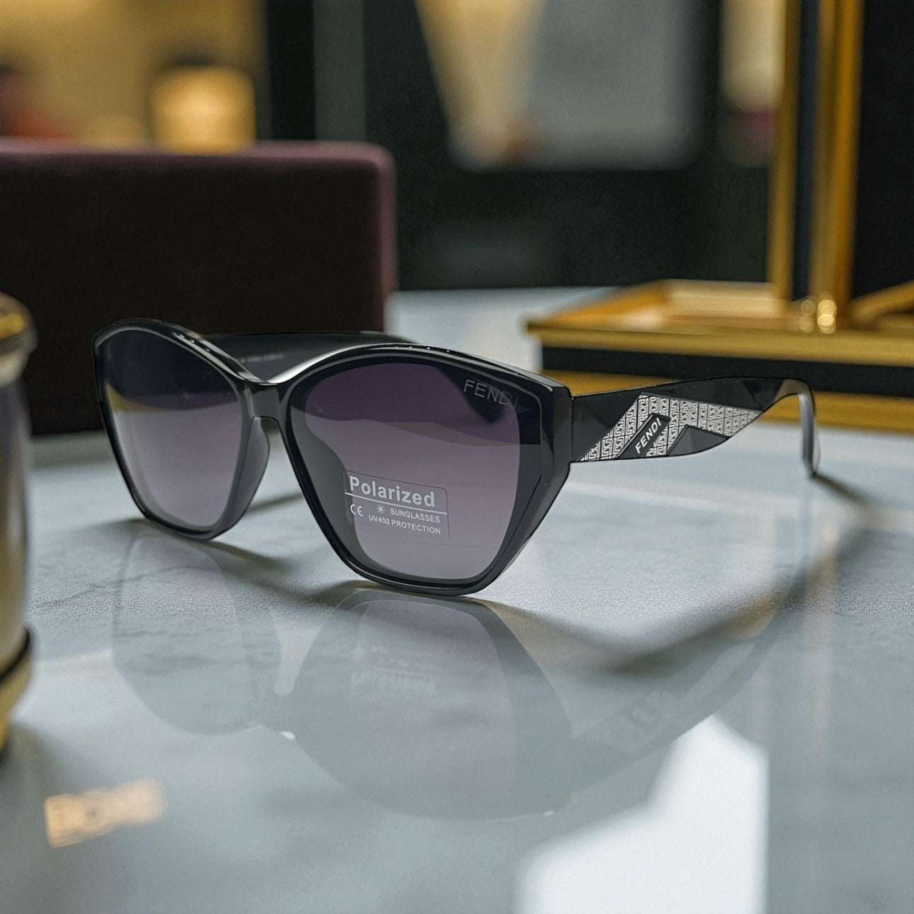 Fendi Polarized Sunglasses – Black Cat-Eye Frame with Silver Monogram Temples UV400